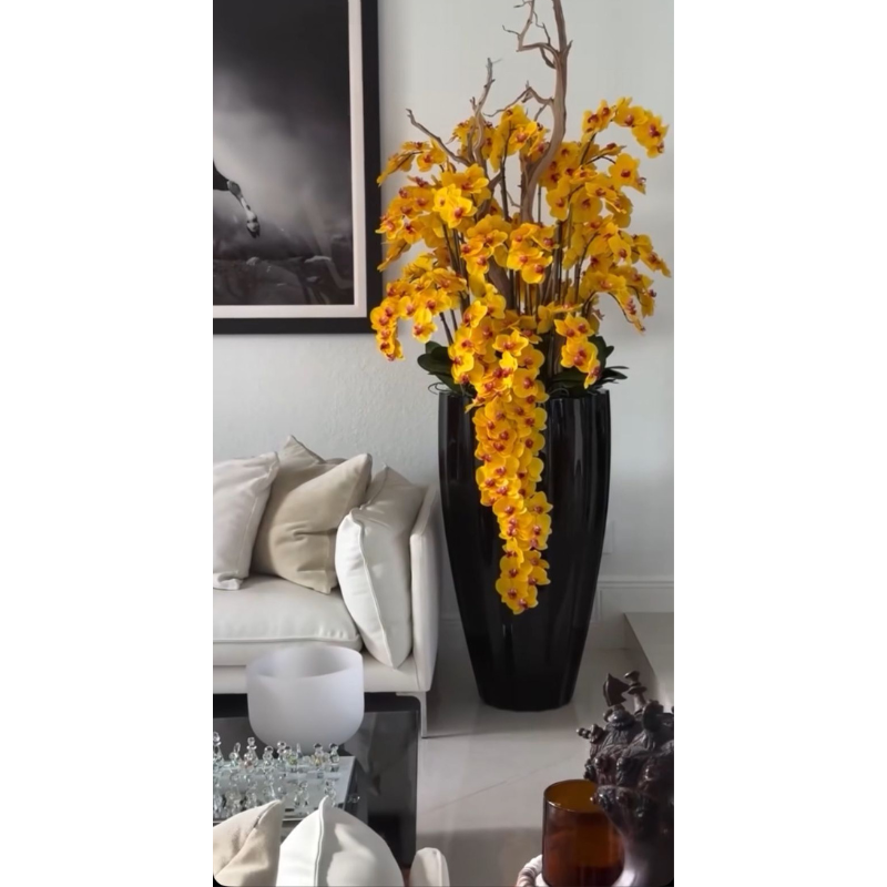 San Jose Vase in shiny black with hanging yellow orchids